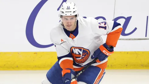 Mathew Barzal #13 of the New York Islanders controls the puck during a game against the Chicago Blackhawks at the United Center on December 15, 2024 in Chicago, Illinois.