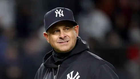 Aaron Boone #17 of the New York Yankees walks back to the dugout after a pitching change in the eighth inning against the Arizona Diamondbacks at Yankee Stadium on April 01, 2025 in the Bronx borough of New York City.