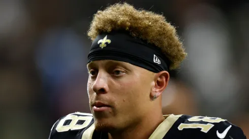 Spencer Rattler #18 of the New Orleans Saints looks on against the Tennessee Titans at Mercedes Benz Superdome on August 25, 2024 in New Orleans, Louisiana.