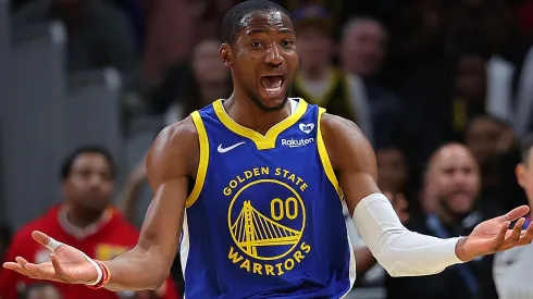 Jonathan Kuminga #00 of the Golden State Warriors reacts after drawing his sixth foul against Trae Young #11 of the Atlanta Hawks.