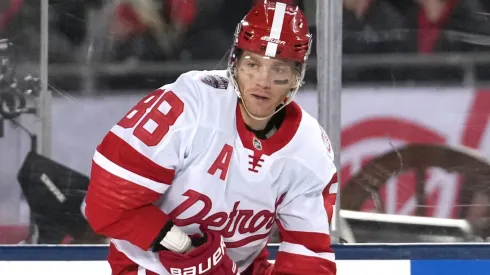 Patrick Kane during a Detroit Red Wings game in 2025, showcasing his trademark puck control and vision.