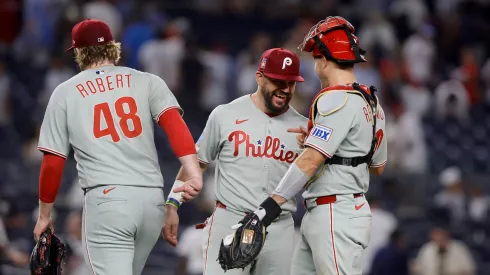 Philadelphia Phillies' players celebrate after defeating the New York Yankees.
