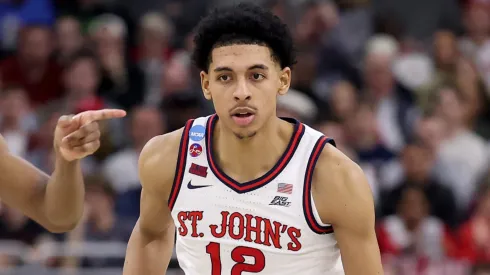 Luis Jr. #12 of the St. John's Red Storm dribbles against the Arkansas Razorbacks during the second half in the second round of the NCAA Men's Basketball Tournament in 2025.