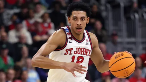RJ Luis Jr. #12 of St. John's Red Storm dribbles the ball during the first half in the first round of the NCAA Men's Basketball Tournament against the Omaha Mavericks at Amica Mutual Pavillion on March 20, 2025.