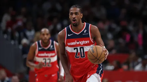 Alex Sarr #20 of the Washington Wizards handles the ball against the Orlando Magic.