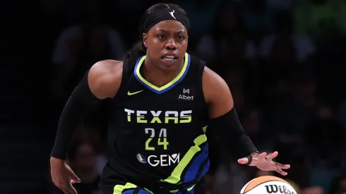 Arike Ogunbowale #24 of the Dallas Wings dribbles the ball during game against the New York Liberty at Barclays Center on August 05, 2025.