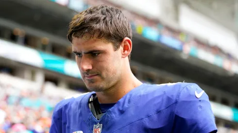 Daniel Jones #8 of the New York Giants leaves the field after an injury against the Miami Dolphins during the fourth quarter at Hard Rock Stadium on October 08, 2023 in Miami Gardens, Florida.