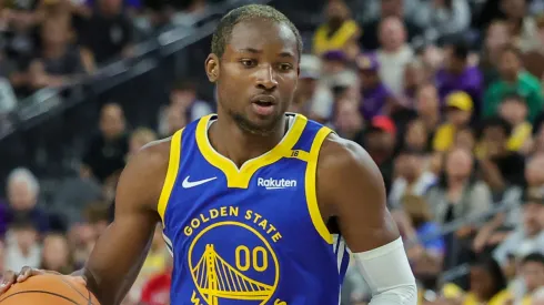 Jonathan Kuminga #00 of the Golden State Warriors brings the ball up the court against the Los Angeles Lakers.