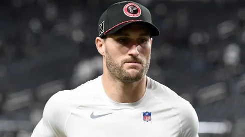 Kirk Cousins #18 of the Atlanta Falcons runs off the field after defeating the Las Vegas Raiders in the game at Allegiant Stadium on December 16, 2024 in Las Vegas, Nevada.