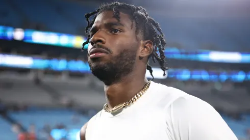 Quarterback Shedeur Sanders #12 of the Cleveland Browns walks off the field following the NFL Preseason 2025 game against the Carolina Panthers.