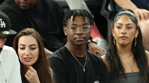 Bryce James (C), son of LeBron James #6 of Team United States, looks on during a Men's basketball semifinals match between Team United States and Team Serbia
