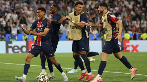 Senny Mayulu of Paris Saint-Germain celebrates scoring his team's fifth goal with teammates during the UEFA Champions League Final 2025 between Paris Saint-Germain and FC Inter.