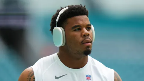 Chop Robinson #44 of the Miami Dolphins warms up prior to in a preseason game against the Washington Commanders at Hard Rock Stadium on August 17, 2024 in Miami Gardens, Florida.