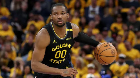 Jonathan Kuminga #00 of the Golden State Warriors dribbles the ball against the Minnesota Timberwolves in Game Four of the Western Conference Second Round NBA Playoffs at Chase Center on May 12, 2025 in San Francisco, California.