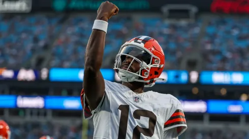 Shedeur Sanders #12 of the Cleveland Browns reacts after a touchdown during the 1st half of an NFL Preseason 2025 game against the Carolina Panthers at Bank of America Stadium on August 08, 2025.
