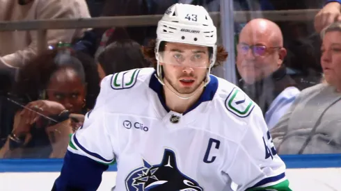 Quinn Hughes #43 of the Vancouver Canucks skates against the New York Islanders at UBS Arena on March 26, 2025 in Elmont, New York.
