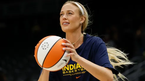 Sophie Cunningham #8 of the Indiana Fever warms up before the game against the Seattle Storm at Climate Pledge Arena on June 24, 2025.