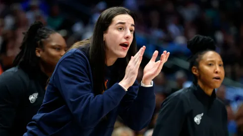 Caitlin Clark of the Indiana Fever chanting on the sidelines