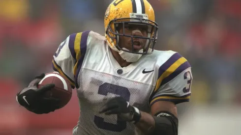 Running back Kevin Faulk of the Louisiana State Tigers moves the ball during a game against the Arkansas Razorbacks at the War Memorial Stadium in 1996.