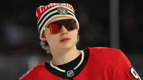 Connor Bedard #98 of the Chicago Blackhawks warms up prior to the 2024 NHL Winter Classic against the St. Louis Blues at Wrigley Field on December 31, 2024 in Chicago, Illinois.