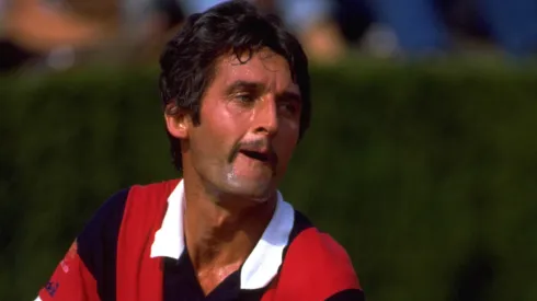 Jose Higueras prepares to serve during a tournament in Spain in 1983.