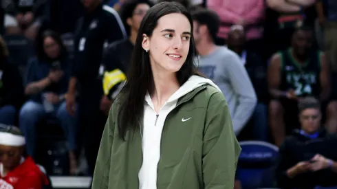 Caitlin Clark #22 of the Indiana Fever walks on the court.