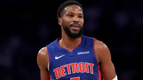 Malik Beasley #5 of the Detroit Pistons reacts to his three point shot against the Knicks.