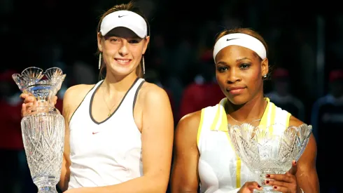 Maria Sharapova of Russia and Serena Williams pose together after the WTA Tour Championship Tournament final.
