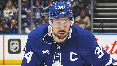 Auston Matthews #34 of the Toronto Maple Leafs skates with the puck.