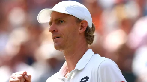 Kevin Anderson celebrates a point against Roger Federer during 2018 Wimbledon.