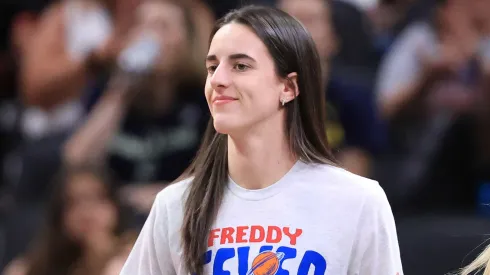 Caitlin Clark #22 of the Indiana Fever looks on against the Dallas Wings.