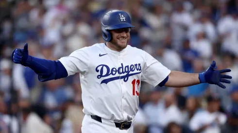 Max Muncy #13 of the Los Angeles Dodgers celebrates his home run.