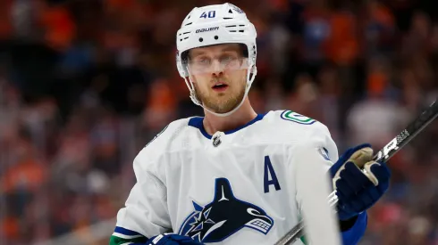 Elias Pettersson #40 of the Vancouver Canucks skates with the puck.