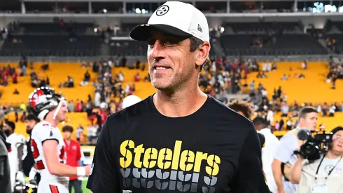Aaron Rodgers #8 of the Pittsburgh Steelers walks off the field after the NFL Preseason 2025 game.