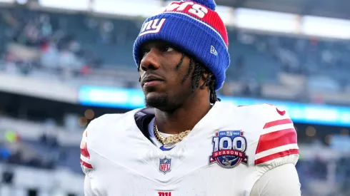 Malik Nabers #1 of the New York Giants walks off the field.