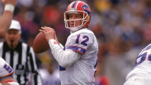 Quarterback Jim Kelly #12 of the Buffalo Bills looks to pass during a game against the Los Angeles Raiders in 1991.