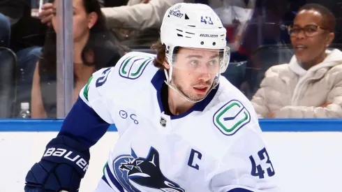 Quinn Hughes in action for the Vancouver Canucks during the 2024-25 NHL season