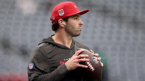 Baker Mayfield warms up prior to the game against the Texans on September 15, 2025 in Houston.