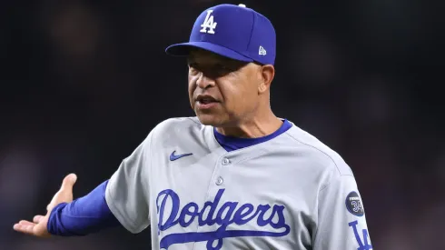 Manager Dave Roberts #30 of the Los Angeles Dodgers gestures.