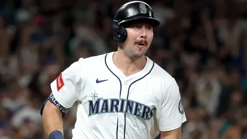 Cal Raleigh #29 of the Seattle Mariners celebrates his solo home run, his 60th of the season.