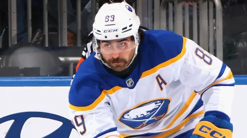 Alex Tuch #89 of the Buffalo Sabres skates in an NHL game.