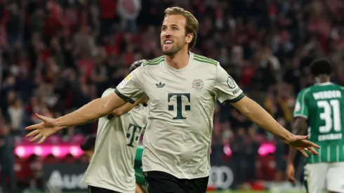 Harry Kane celebrates after scoring a goal against Werder Bremen.