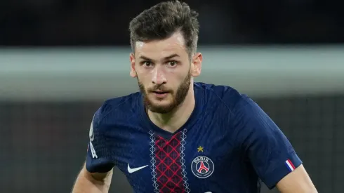 Khvicha Kvaratskhelia of Paris Saint-Germain runs with the ball.