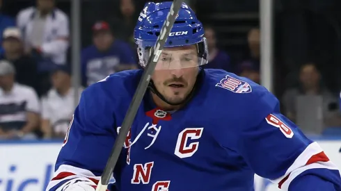 J.T. Miller #8 of the New York Rangers skates against the New York Islanders.
