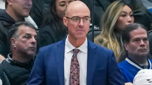 Calgary Flames head coach Ryan Huska looks on during an NHL game.