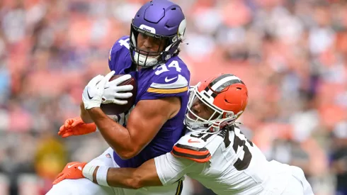 Nick Muse #34 of the Minnesota Vikings is tackled by Chase Williams #31 of the Cleveland Browns.