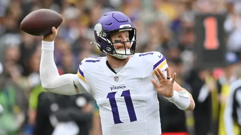 Carson Wentz of Minnesota Vikings (#11) makes a pass.
