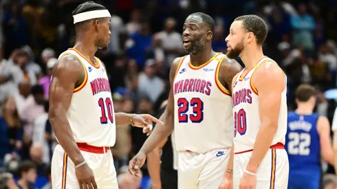 Jimmy Butler, Draymond Green and Stephen Curry of Golden State Warriors during an NBA game.