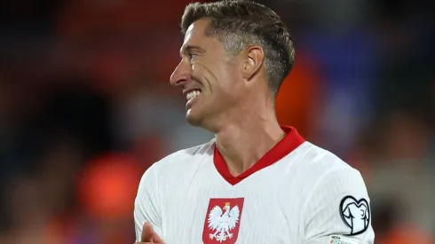 Robert Lewandowski of Poland looks on.