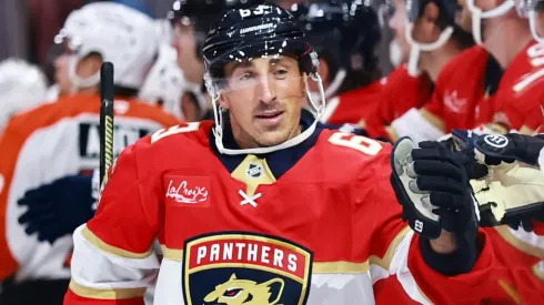 Brad Marchand #63 of the Panthers high fives teammates after scoring against the Flyers.